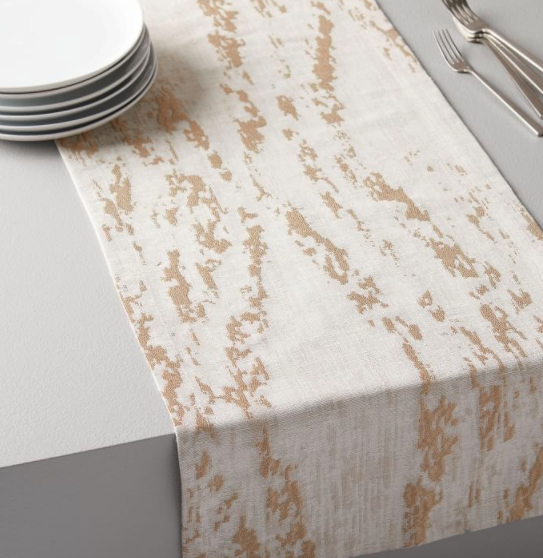 gold and white table runner